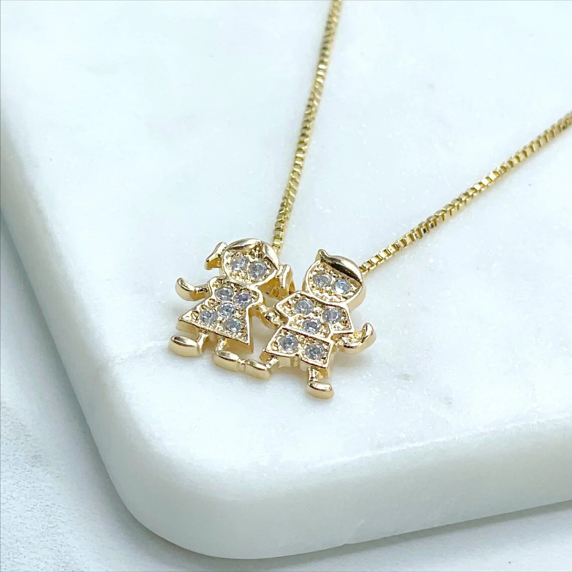 Chain and Pendant Set. Box Link Chain with Boy and Girl Pendant in Cubic Zirconia 18k Gold Filled. Bundle and Save. FREE SHIPPING on orders of $100 and over. Sam's Jewelry World USA.