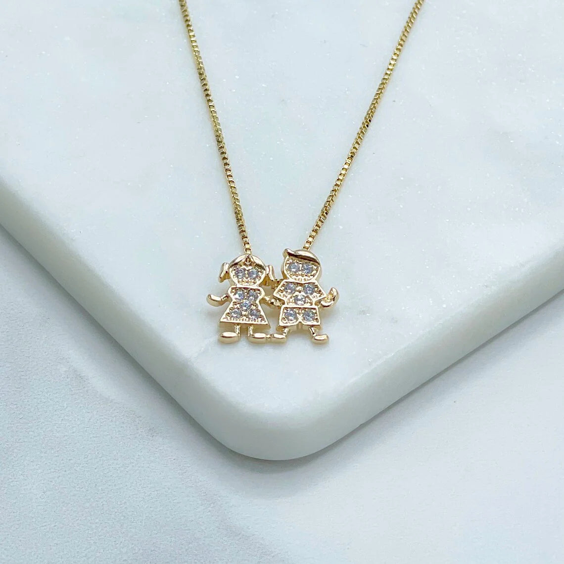 Chain and Pendant Set. Box Link Chain with Boy and Girl Pendant in Cubic Zirconia 18k Gold Filled. Bundle and Save. FREE SHIPPING on orders of $100 and over. Sam's Jewelry World USA.