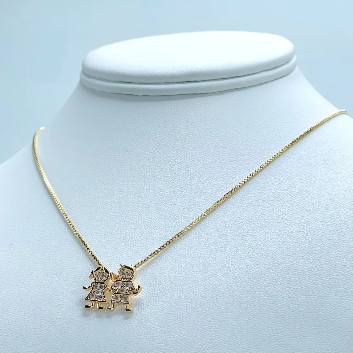 Chain and Pendant Set. Box Link Chain with Boy and Girl Pendant in Cubic Zirconia 18k Gold Filled. Bundle and Save. FREE SHIPPING on orders of $100 and over. Sam's Jewelry World USA.