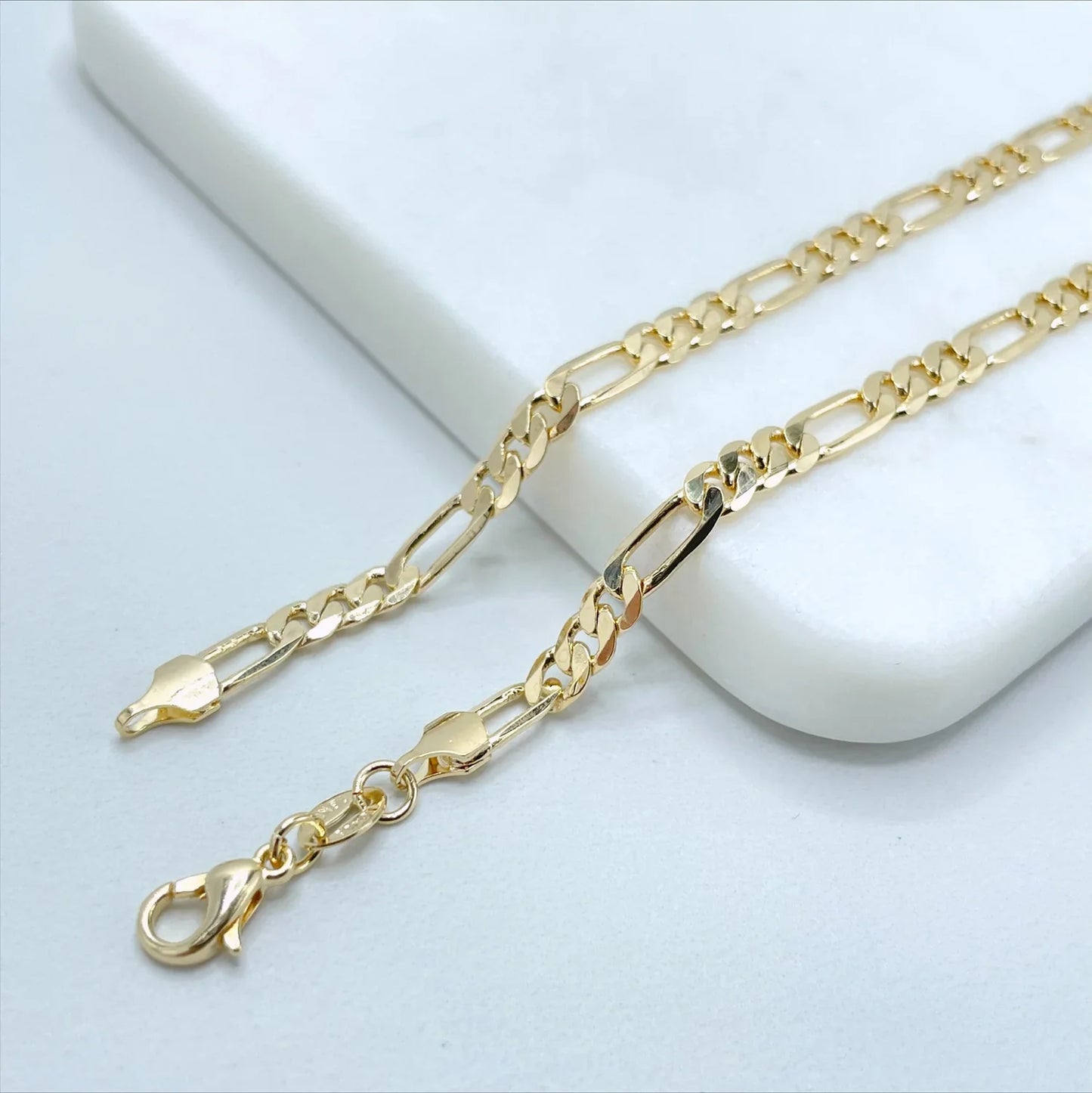 Chain Figaro Link 23.5" Long, 5mm Wide 18k Gold Filled. Bundle and Save. FREE SHIPPING on orders of $100 and over. Sam's Jewelry World USA.