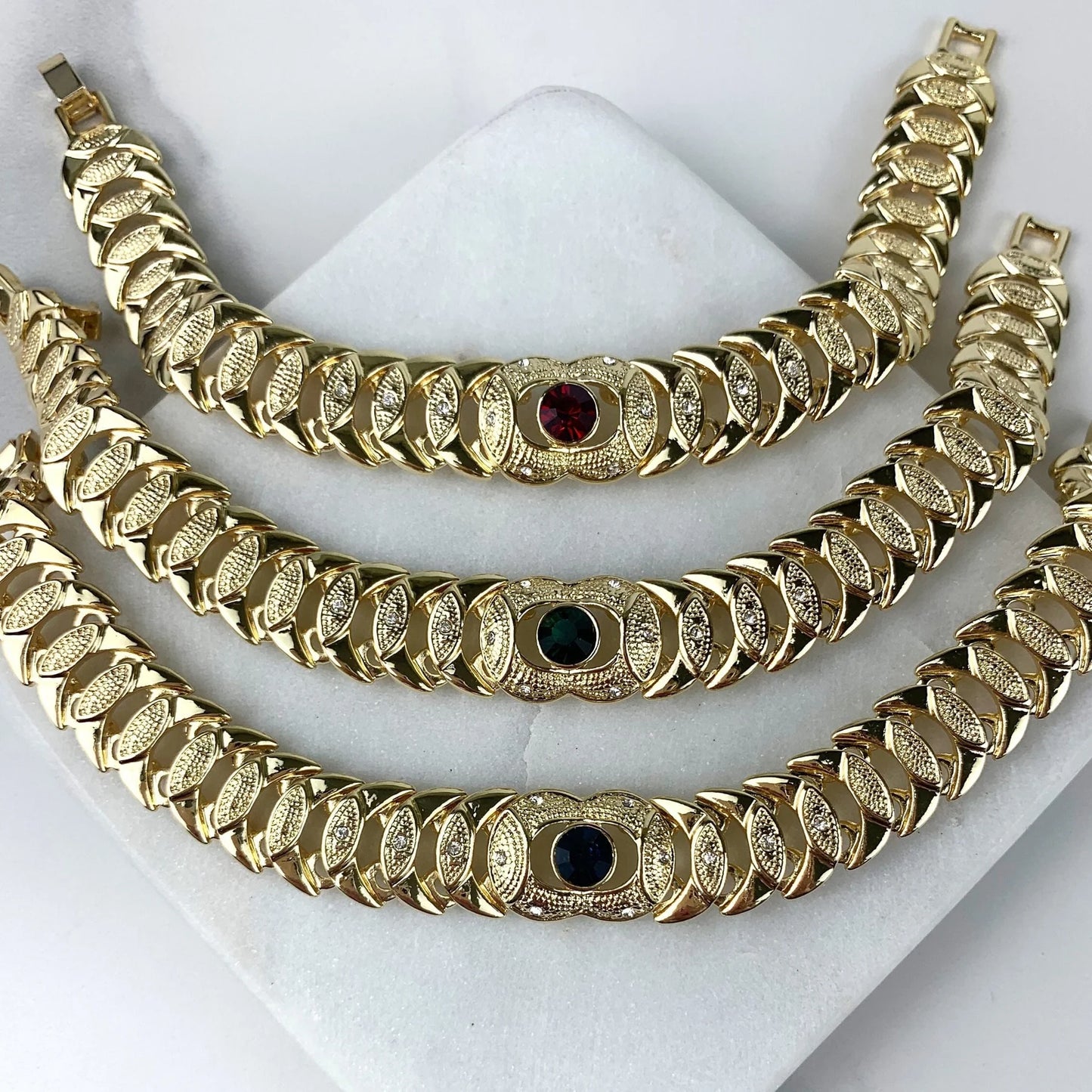 Bracelet Stone Cubic Zirconia. Blue ,Red, or Green Stone, Texturized 18k Gold Filled. Bundle and Save. FREE SHIPPING on orders of $100 and over. Sam's Jewelry World USA.