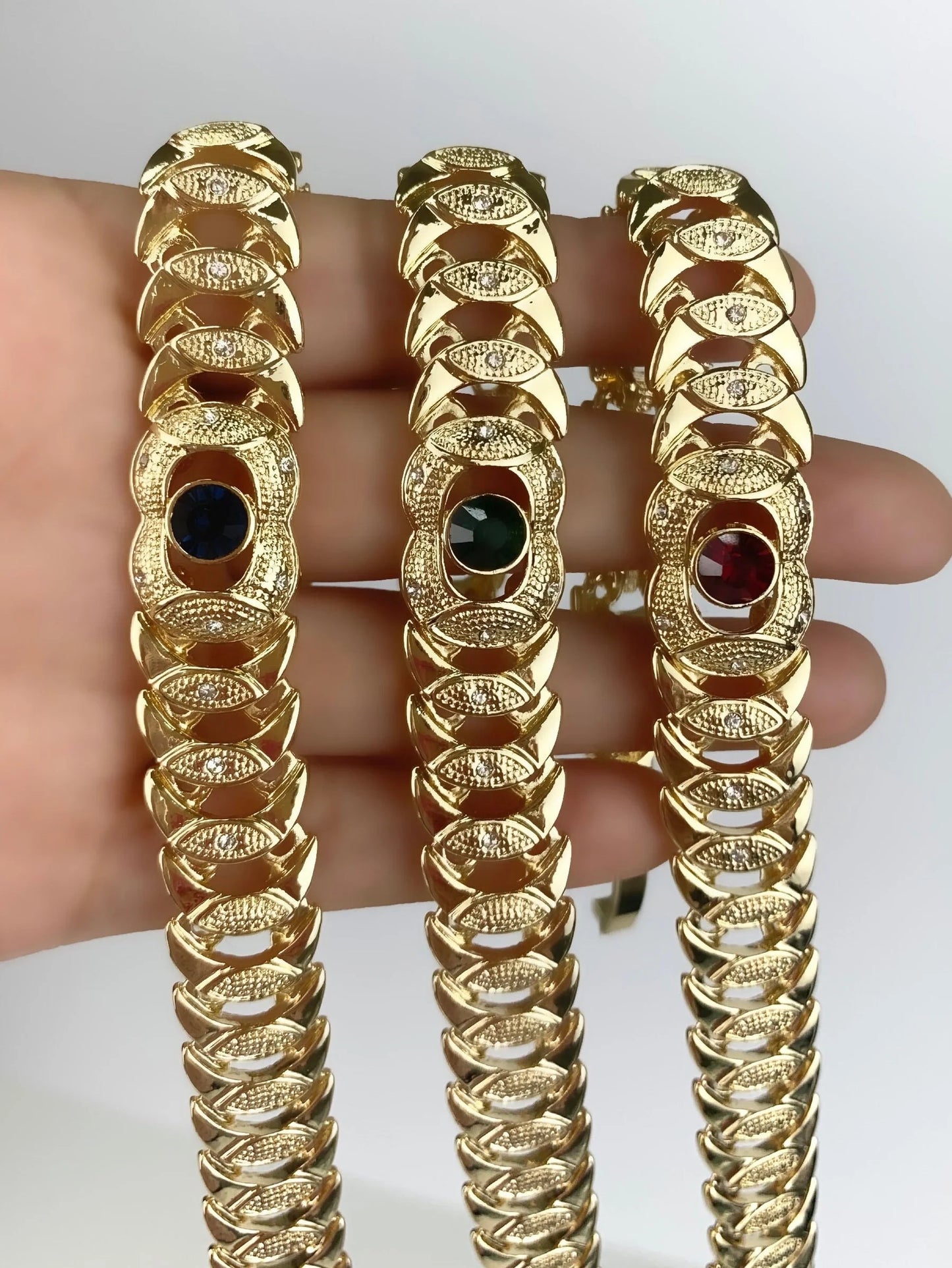 Bracelet Stone Cubic Zirconia. Blue ,Red, or Green Stone, Texturized 18k Gold Filled. Bundle and Save. FREE SHIPPING on orders of $100 and over. Sam's Jewelry World USA.