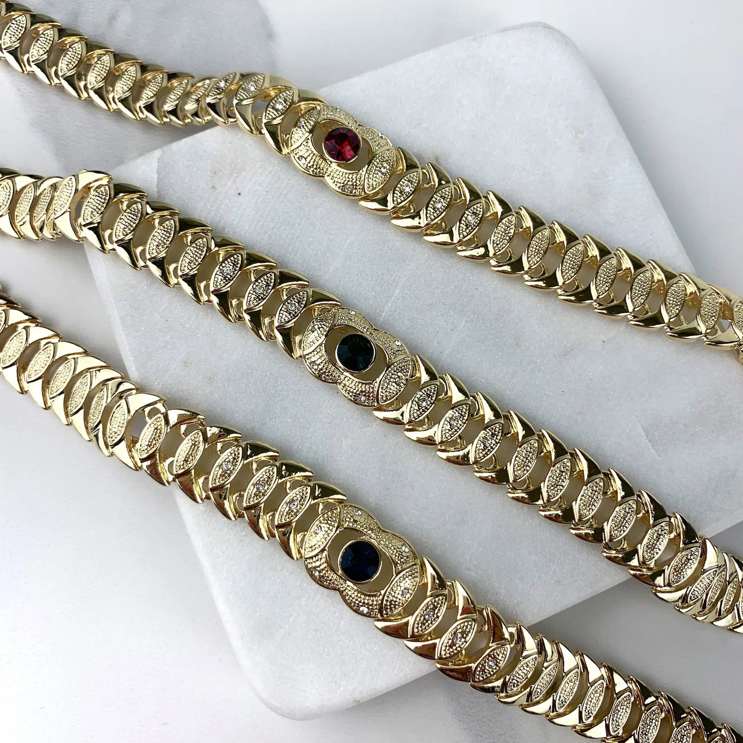 Bracelet Stone Cubic Zirconia. Blue ,Red, or Green Stone, Texturized 18k Gold Filled. Bundle and Save. FREE SHIPPING on orders of $100 and over. Sam's Jewelry World USA.
