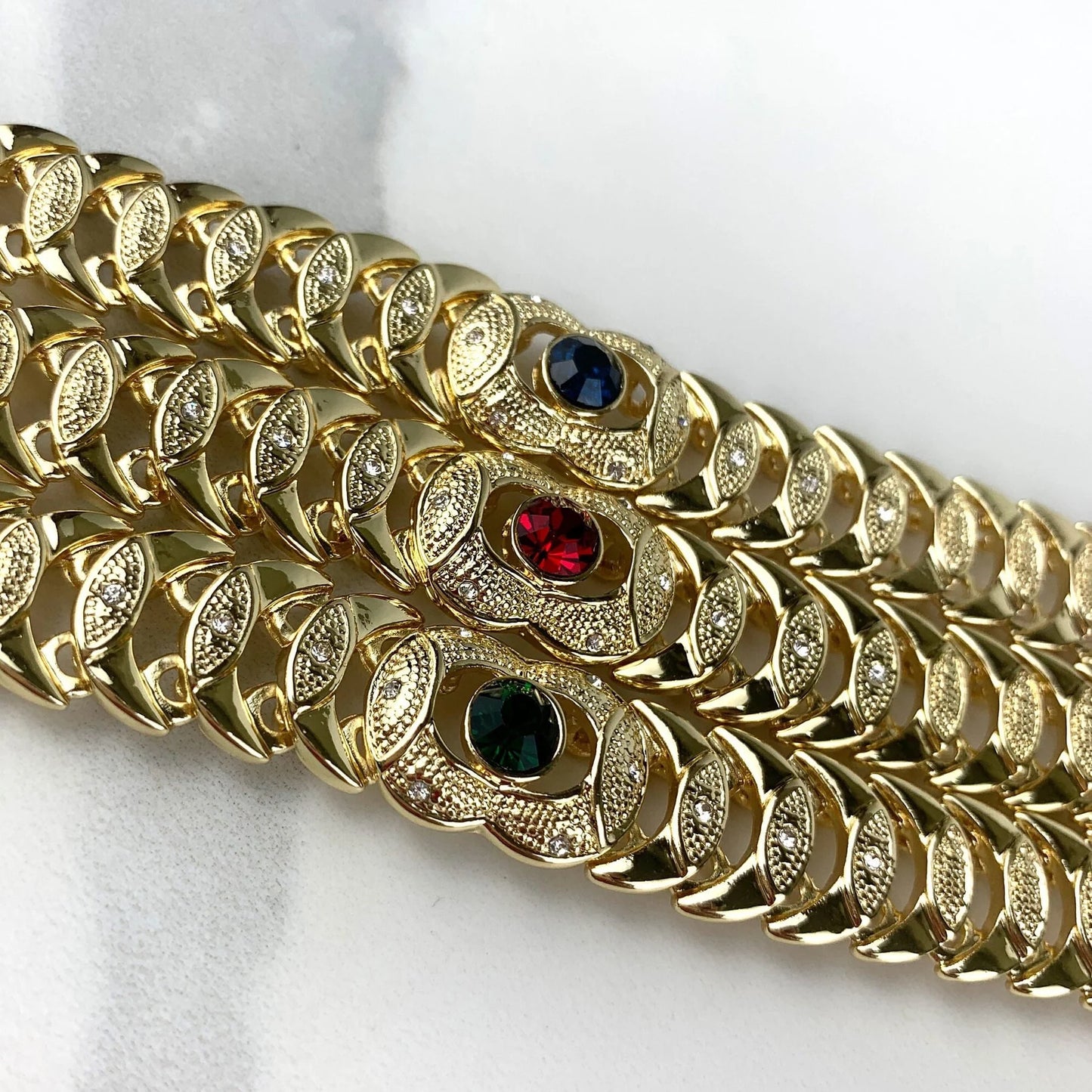 Bracelet Stone Cubic Zirconia. Blue ,Red, or Green Stone, Texturized 18k Gold Filled. Bundle and Save. FREE SHIPPING on orders of $100 and over. Sam's Jewelry World USA.