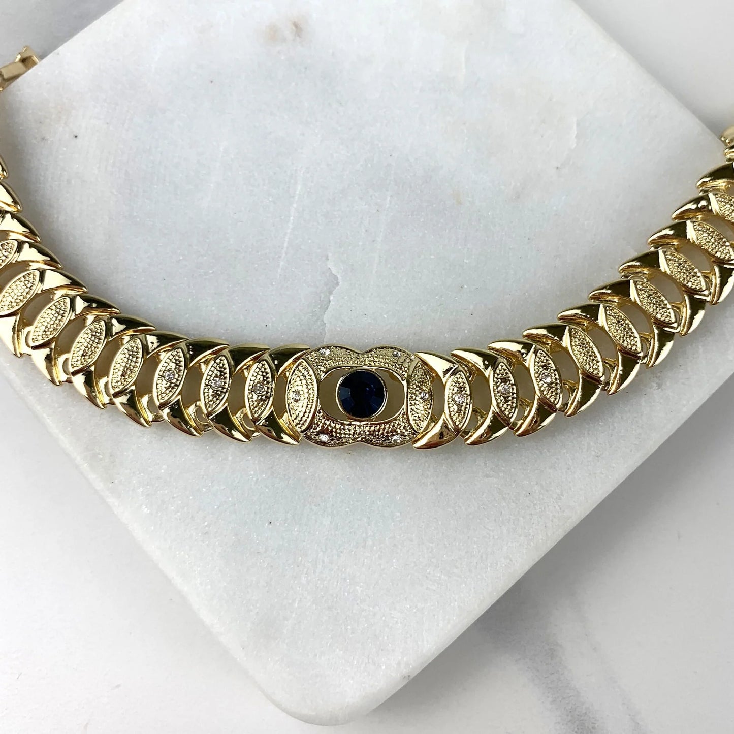 Bracelet Stone Cubic Zirconia. Blue ,Red, or Green Stone, Texturized 18k Gold Filled. Bundle and Save. FREE SHIPPING on orders of $100 and over. Sam's Jewelry World USA.