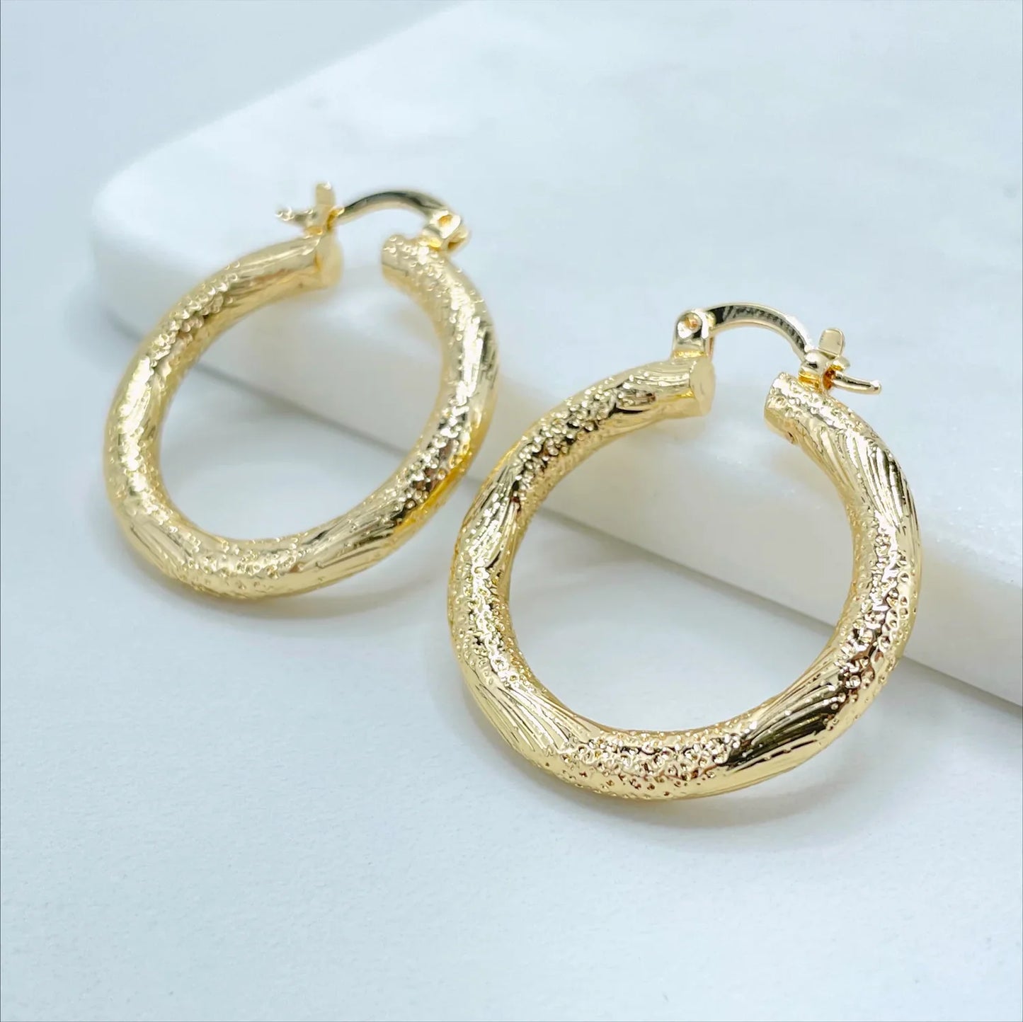 Earrings Hoop Texturized 18k Gold Filled. Bundle and Save. FREE SHIPPING on orders of $100 and over. Sam's Jewelry World USA.