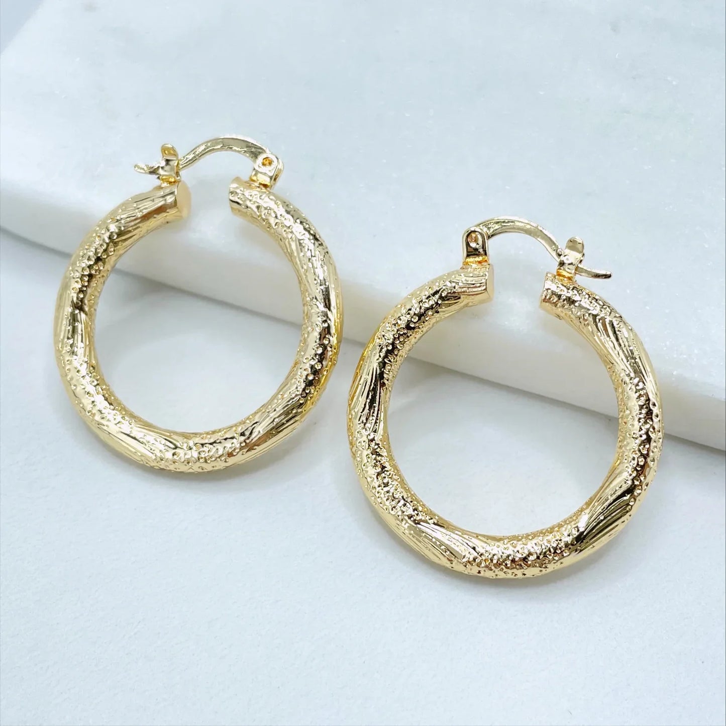 Earrings Hoop Texturized 18k Gold Filled. Bundle and Save. FREE SHIPPING on orders of $100 and over. Sam's Jewelry World USA.