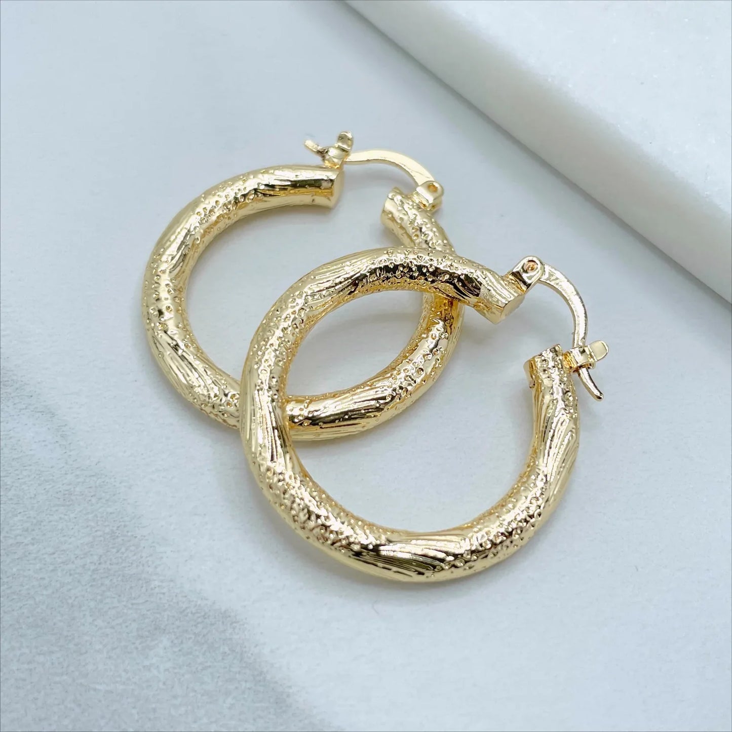 Earrings Hoop Texturized 18k Gold Filled. Bundle and Save. FREE SHIPPING on orders of $100 and over. Sam's Jewelry World USA.