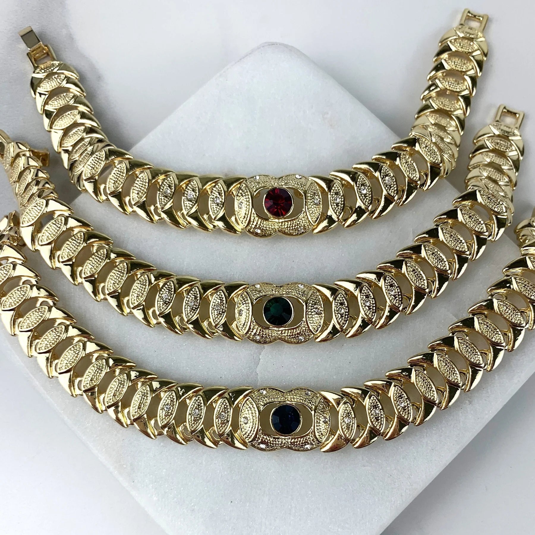 Bracelet Stone Cubic Zirconia. Blue ,Red, or Green Stone, Texturized 18k Gold Filled.  Bundle and Save. FREE SHIPPING on orders of $100 and over. Sam's Jewelry World USA.